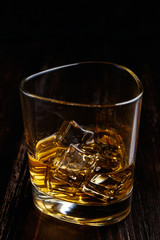 whiskey with ice in modern glasses