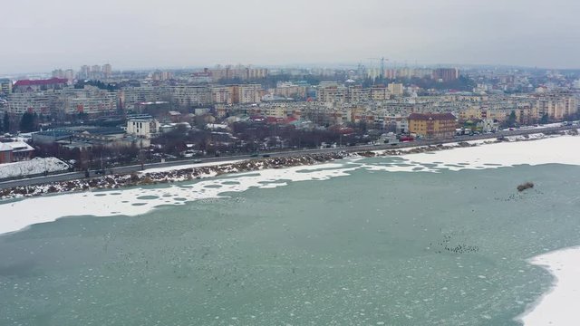 Air view with various birds of the Pitesti lake on the Arges river