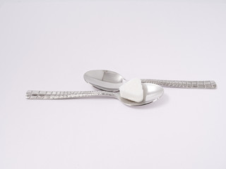 silverware forks spoons knives cutlery on a white background