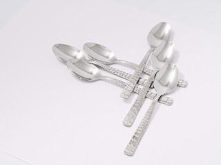 silverware forks spoons knives cutlery on a white background