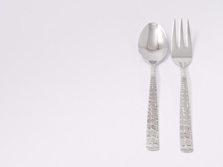 silverware forks spoons knives cutlery on a white background