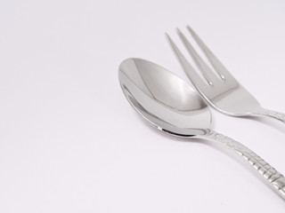 silverware forks spoons knives cutlery on a white background