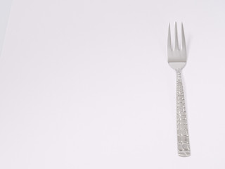 silverware forks spoons knives cutlery on a white background