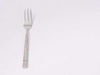 silverware forks spoons knives cutlery on a white background
