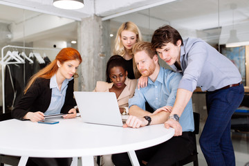 Obraz premium Skilled designers and business people working