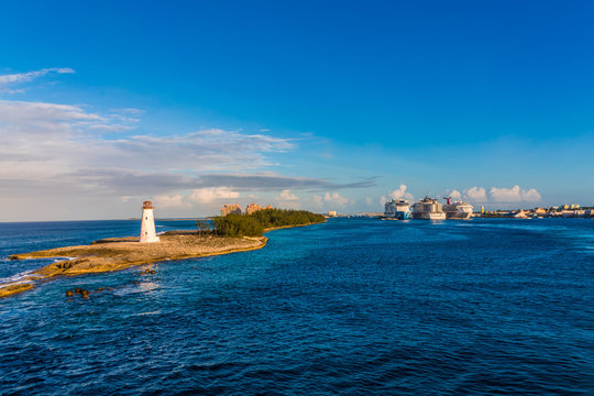 Lighthouse with Cruise Ships in Background