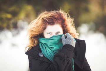 Natural redhead with green scarf