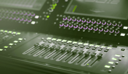 Light and Sound control mixer for Event on stage. Professional backstage device equipment. Professional sound and audio mixer control panel with buttons and sliders.