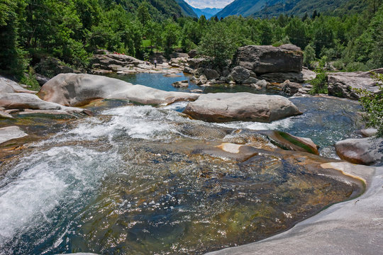 Some tourists in the spectacular Toce degli Orridi di Uriezzo gorges in Piedmont, Italy.