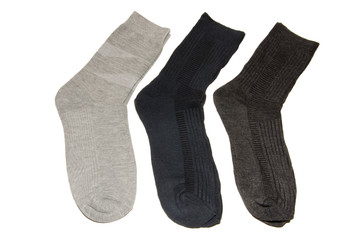 Three pairs of multi-colored thin socks. Thin, summer running socks. Isolated on white background.