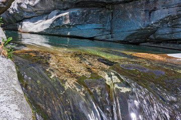 The spectacular water games of the Toce River in the Gorges of the Uriezzo Orrides in Piedmont, Italy.