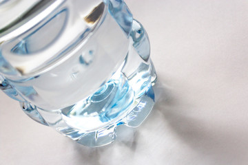 Drinking water in a plastic bottle