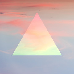 Aesthetic art collage with beautiful sky sunset and mirror reflection in triangle frame.