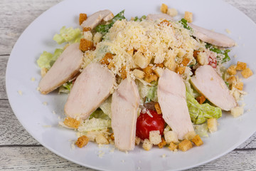 Caesar salad with chicken breast