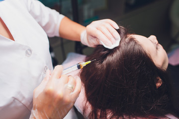Platelet rich plasma injection procedure. Hair growth stimulation. PRP therapy process.