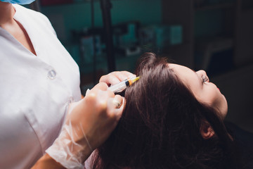 Platelet rich plasma injection procedure. Hair growth stimulation. PRP therapy process.