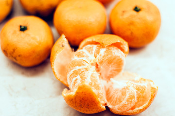 Fresh mandarin oranges (Citrus reticulata), vegetarian concept.