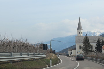 view of the Alpine highway, fortress, traffic, mountains. Italian villages