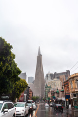 Downtown San Francisco with its fog and business centers buildings.