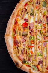 The Bavarian sausages and marinated vegetables pizza under mustard