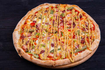 The Bavarian sausages with bacon, cucumbers and leek with mozzarella and mustard sauce