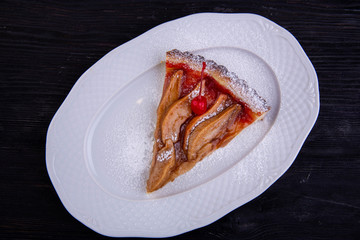 Home-made sand cake with fruit according to the recipe of the grandmother