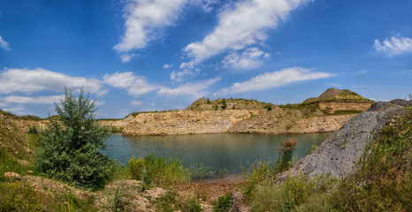 Fototapeta na wymiar Panorama of an abandoned quarry near Mospino near Donetsk