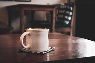 coffee cup on wooden table