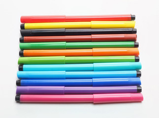 Fototapeta premium Twelve markers on a white background