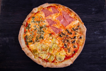 Pizza from four types of a stuffing 