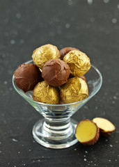 Handmade candies. Lawyer truffle with liqueur and vanilla. Home sweetness. Selective focus.
