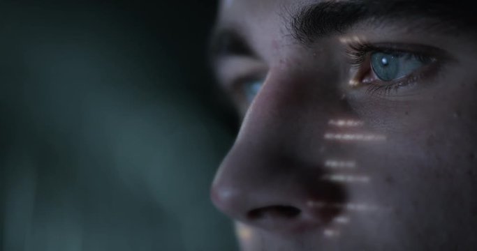 Data projection on face of a young man