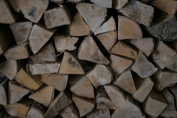 Birch firewoods at wood pile at countryside, village mood background