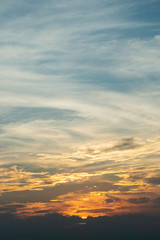 sunlight through cloud on dramatic sunset sky