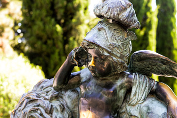 bronze angel calls over the shell