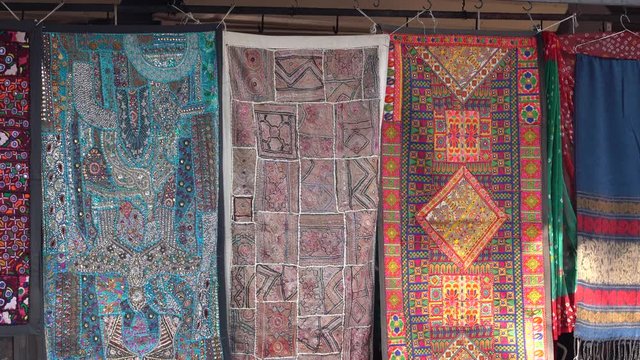 Patchwork carpet for sale in local market. Udaipur, Rajasthan, India. Close up