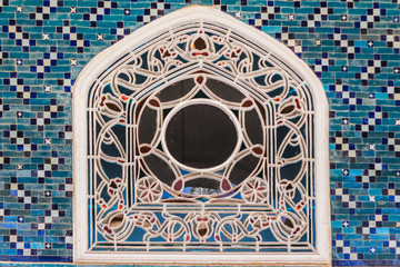 Photo of Iznik (mosaic) tiles around window of a mosque in Istanbul Turkey