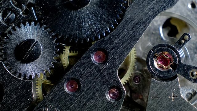 Watch mechanism macro loop.Old vintage clock mechanism working