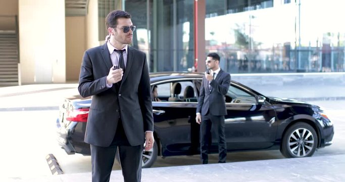 Bodyguards escorting a businessman