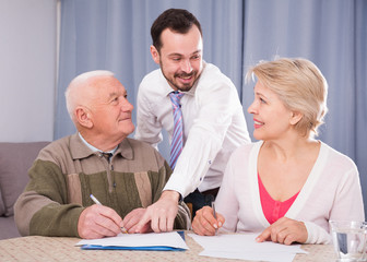 Couple signing agreement