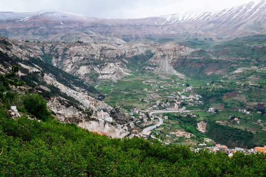 Faraya valley and village with scattered houses shot from the hill. Lebanon
