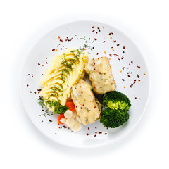 Roast meatballs with mashed potatoes and broccoli on white background