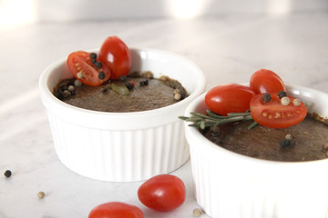 Fresh pate with red tomatoes, pepper and cream