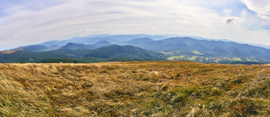Beautiful panoramic view of the Bieszczady mountains in the early autumn, Bieszczady National Park (Polish: Bieszczadzki Park Narodowy), Poland. © udmurd