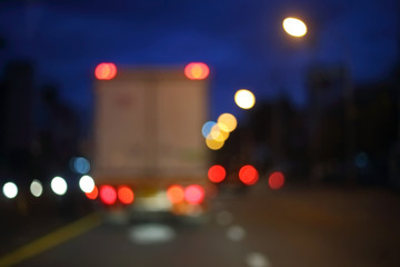 night light of truck car on the city street, abstract blur bokeh background