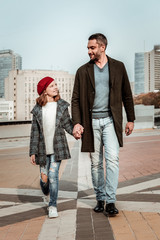 Daughter sharing her stories with her father