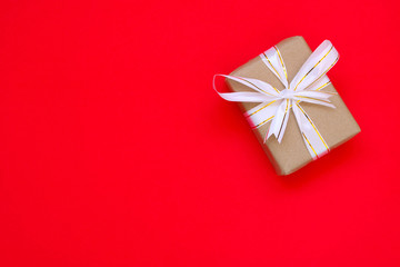 Gift Box on Red Paper