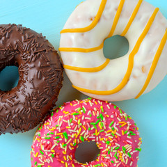 Assorted donuts on blue