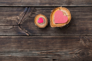 heart shaped paper  on  wooden background