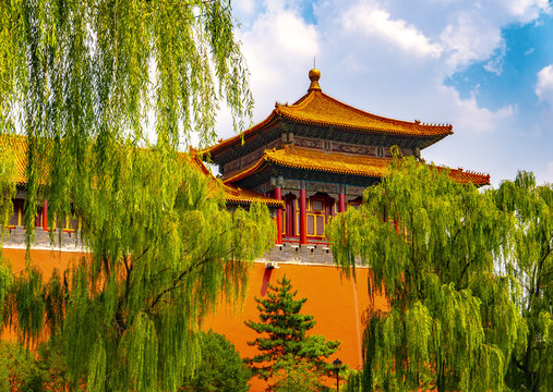 Forbidden city in Pekin surrounded with weeping willows